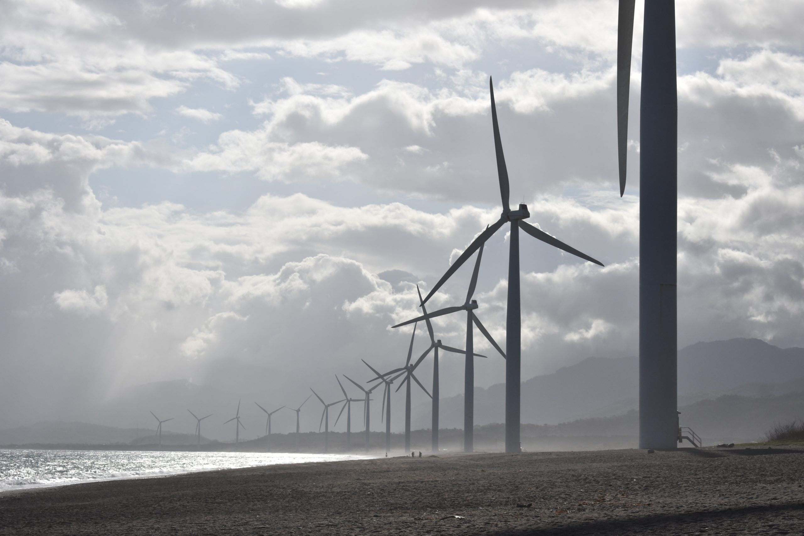 Windmills On Seashore Under White Clouds 1108814